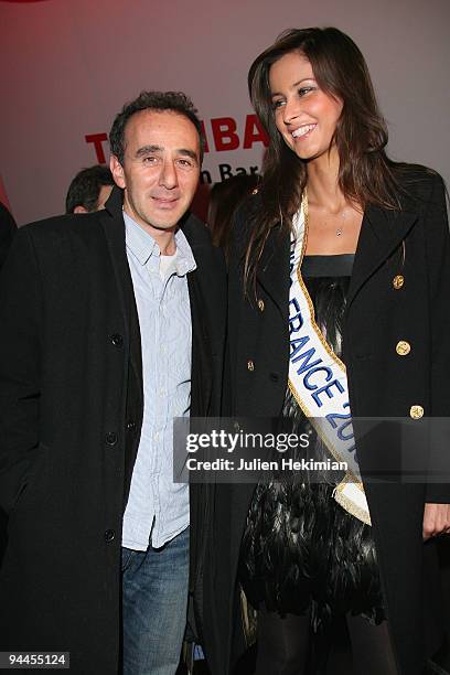 Miss France 2009 Malika Menard and Elie Semoun attend the Toshiba 'Go to Space' party at Palais De Tokyo on December 14, 2009 in Paris, France.