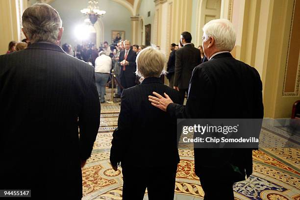 Senate Majority Leader Harry Reid , Sen. Patty Murray and Senate Banking Committee Chairman Christopher Dodd head to the microphones after an evening...