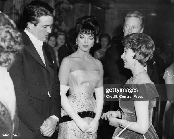 Princess Margaret meets actors Warren Beatty, Joan Collins and Van Johnson at a the premiere of the film 'The Facts of Life' at the Odeon Leicester...