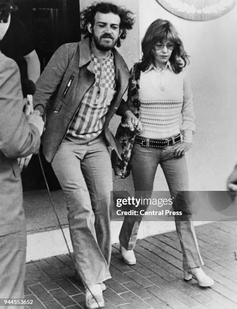 English singer and musician Joe Cocker and his girlfriend Eileen Webster leave their hotel in Melbourne, Australia, where they are both facing...