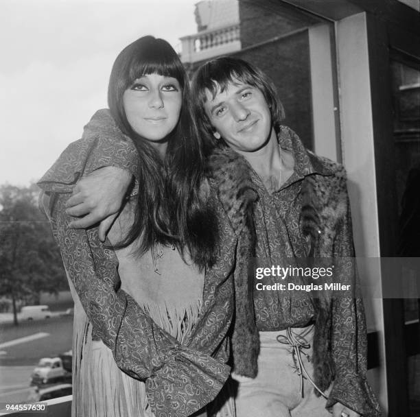 American hit singing duo Sonny and Cher pose outside the Hilton Hotel in London during a reception to promote their current singles, 3rd August 1965.