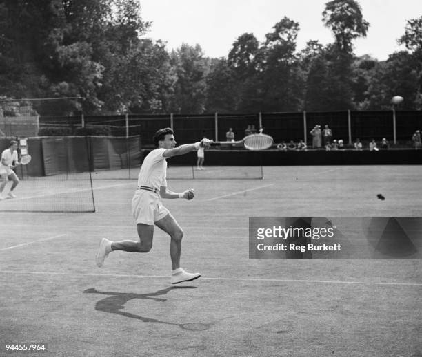 French tennis player Philippe Chatrier during his match against Jaime Bartroli of Spain on the first day of the Wimbledon tournament, London, 25th...
