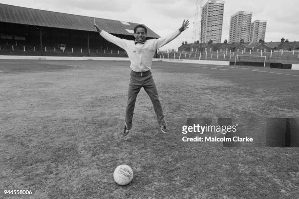 Footballer John Chiedozie jumps for joy after being signed by Leyton Orient on his 17th birthday, 18th April 1977.