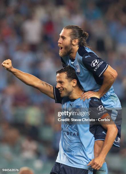 Deyvison Rogerio da Silva, Bobo of the Sydney celebrates scoring his second goal with Joshua Brillante during the round 26 A-League match between...