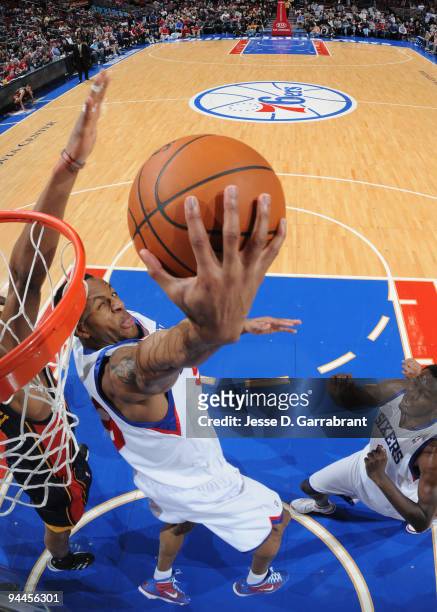 Andre Iguodala of the Philadelphia 76ers shoots against the Golden State Warriors during the game on December 14, 2009 at the Wachovia Center in...