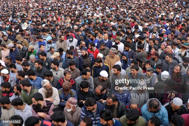 Thousands of people attend the funeral precession of a rebel Eisa Fazili in Srinagar on March12, 2018. Indian government forces killed three rebels...