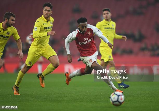 Joe Willock of Arsenal takes on Juan Fernandez Blanco of Villarreal during the match between Arsenal U23 and Villarreal U23 at Emirates Stadium on...