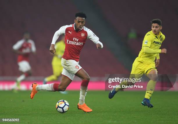 Joe Willock of Arsenal takes on Sergio Lozano Lluch of Villarreal during the match between Arsenal U23 and Villarreal U23 at Emirates Stadium on...