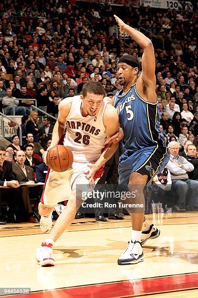 Hedo Turkoglu of the Toronto Raptors drives against Dominic McGuire of the Washington Wizards during the game on December 1, 2009 at Air Canada...