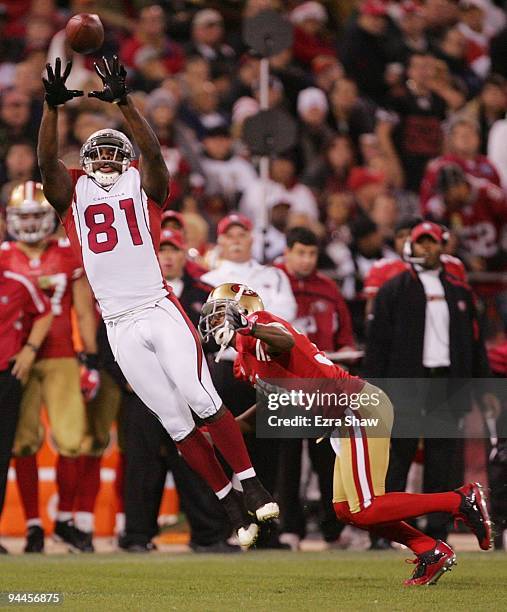 Wide receiver Anquan Boldin of the Arizona Cardinals makes a catch in front of cornerback Dre' Bly of the San Francisco 49ers at Candlestick Park on...