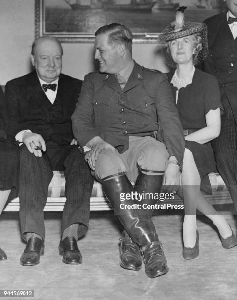 Randolph Churchill , with his parents, statesman Winston Churchill and Clementine Churchill , 1939.