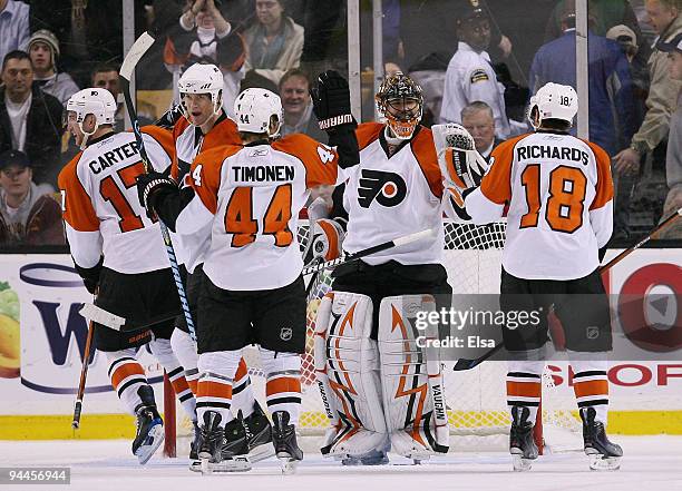 Brian Boucher, Mike Richards, Chris Pronger, Jeff Carter and Kimmo Timonen of the Philadelphia Flyers celebrate the win over the Boston Bruins on...