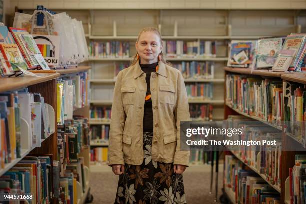 Tamara Edwards, a youth services librarian at the Rutherford County Library, stands for a portrait inside the library in Forest City, NC on April 6,...