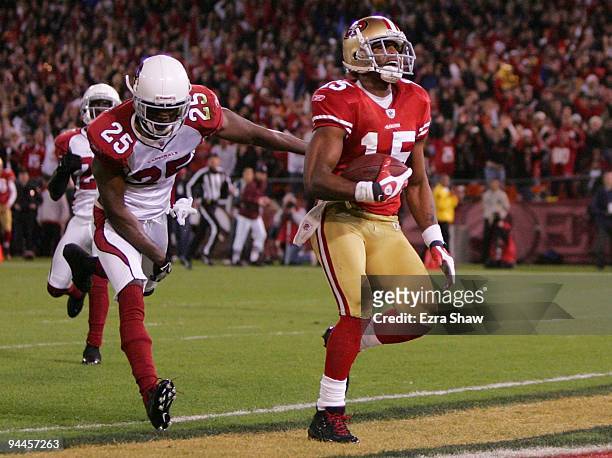 Wide receiver Michael Crabtree of the San Francisco 49ers scores a touchdown in the first half against the Arizona Cardinals at Candlestick Park on...