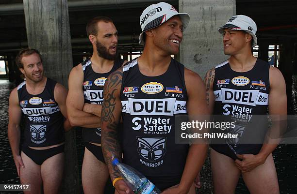 Manu Vatuvei of the Warriors waits to lead his team out into the harbour for start of the Surf Boat Duel between the Blues and the Warriors at the...