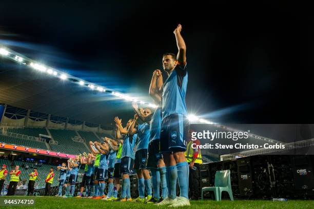 Sydney FC thanks the fans in front of the cove during the round 26 A-League match between Sydney FC and Adelaide United at Allianz Stadium on April...