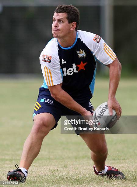 Greg Bird looks to pass during a Gold Coast Titans NRL training session at Robina on December 15, 2009 at the Gold Coast, Australia.