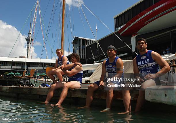 Members of the Blues Super 14 team wait to row into the harbour for start of the Surf Boat Duel between the Blues and the Warriors at the Viaduct...