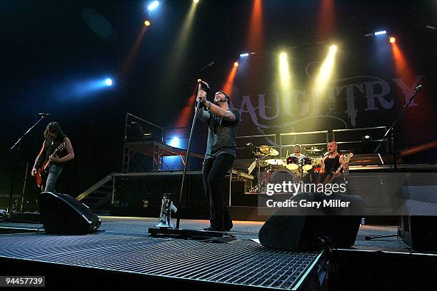 Musician John Steely, vocalist Chris Daughtry, musicians Joey Barnes and Josh "JP" Paul of Daughtry perform in concert at The Frank Erwin Center on...