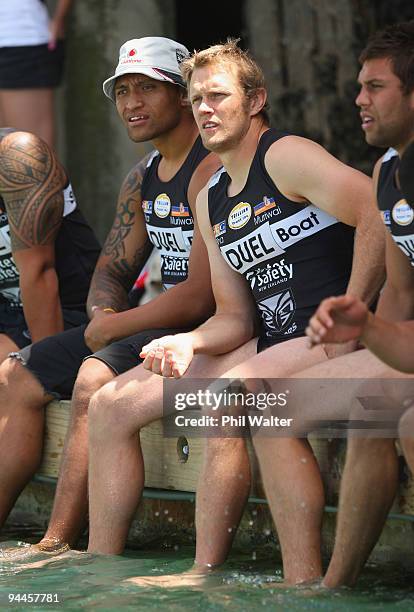 Manu Vatuvei and Micheal Luck of the Warriors watch the action during the Surf Boat Duel between the Blues and the Warriors at the Viaduct Harbour on...