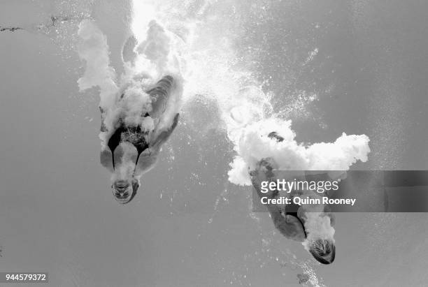 Jennifer Abel And Melissa Citrini-Beaulieu of Canada compete in the Men's 1m Springboard Preliminary Diving on day seven of the Gold Coast 2018...