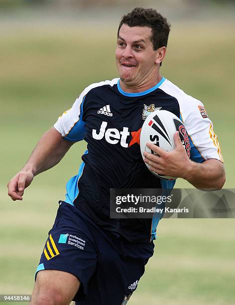 Greg Bird runs with the ball during a Gold Coast Titans NRL training session at Robina on December 15, 2009 at the Gold Coast, Australia.