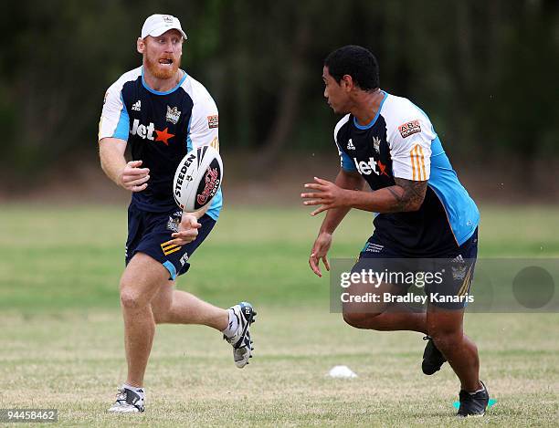 Brad Meyers passes the ball during a Gold Coast Titans NRL training session at Robina on December 15, 2009 at the Gold Coast, Australia.