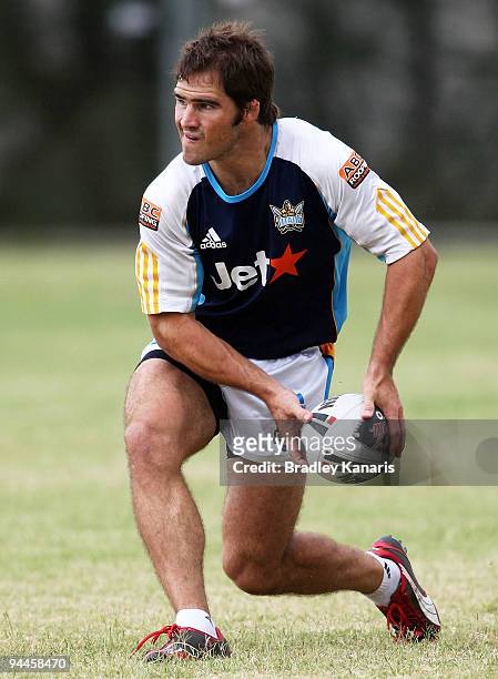 Nathan Friend passes the ball during a Gold Coast Titans NRL training session at Robina on December 15, 2009 at the Gold Coast, Australia.