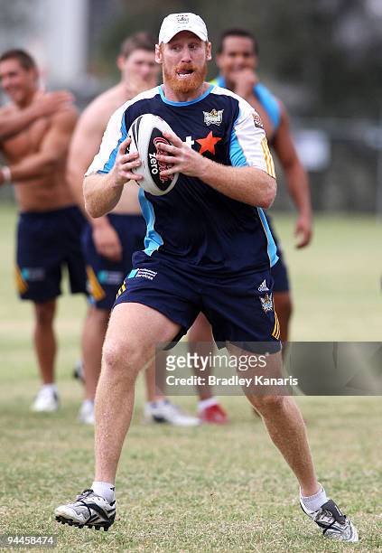 Brad Meyers runs with the ball during a Gold Coast Titans NRL training session at Robina on December 15, 2009 at the Gold Coast, Australia.