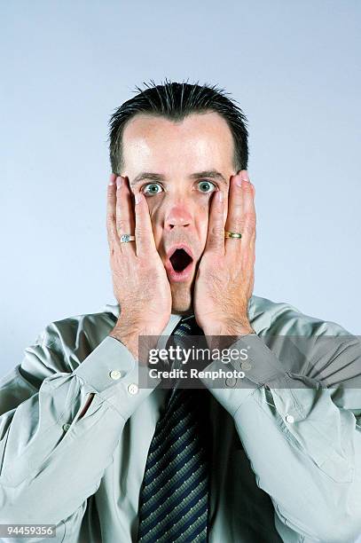 man making "oh no" expression - renphoto stock pictures, royalty-free photos & images