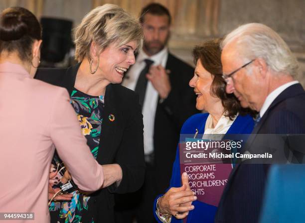 Princess Laurentien of the Netherlands jokes with Queen Silvia of Sweden during the Global Child Forum 2018 at the Stockholm Palace on April 11, 2018...