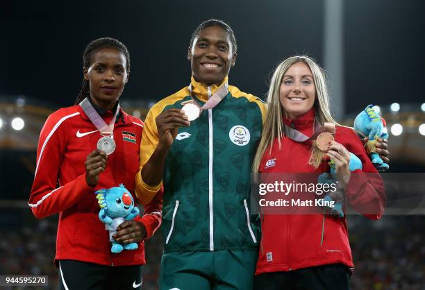 Silver medalist Beatrice Chepkoech of Kenya, gold medalist Caster Semenya of South Africa and bronze medalist Melissa Courtney of Wales pose during...