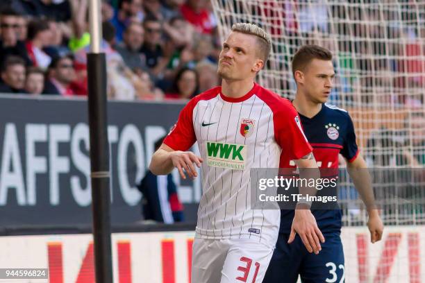 Philipp Max of Augsburg looks on during the Bundesliga match between FC Augsburg and FC Bayern Muenchen at WWK-Arena on April 7, 2018 in Augsburg,...