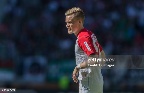 Philipp Max of Augsburg looks on during the Bundesliga match between FC Augsburg and FC Bayern Muenchen at WWK-Arena on April 7, 2018 in Augsburg,...