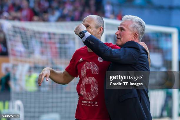 Arjen Robben of Muenchen and Head coach Jupp Heynckes of Muenchen gesture during the Bundesliga match between FC Augsburg and FC Bayern Muenchen at...