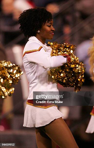 Member of the San Francisco 49ers Gold Rush Cheerleaders performs during the game against the Arizona Cardinals at Candlestick Park on December 14,...