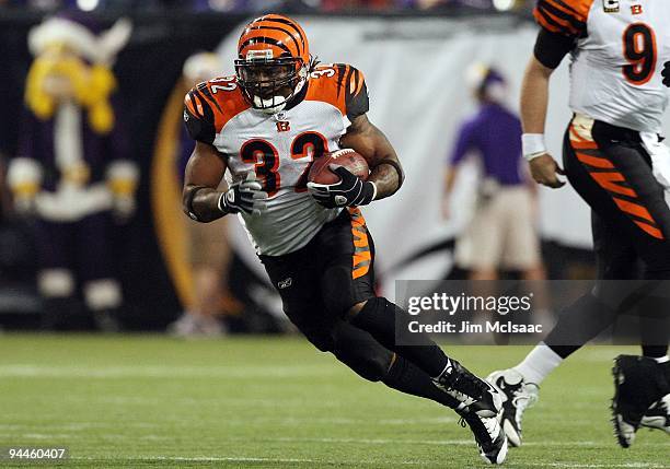 Cedric Benson of the Cincinnati Bengals runs the ball against the Minnesota Vikings on December 13, 2009 at Hubert H. Humphrey Metrodome in...