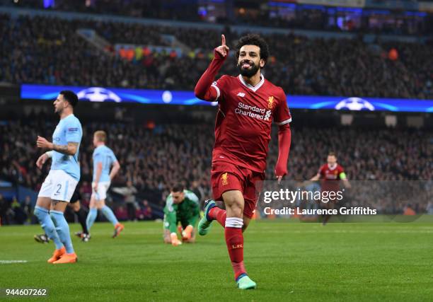 Mohamed Salah of Liverpool celebrates scoring the first goal during the Quarter Final Second Leg match between Manchester City and Liverpool at...