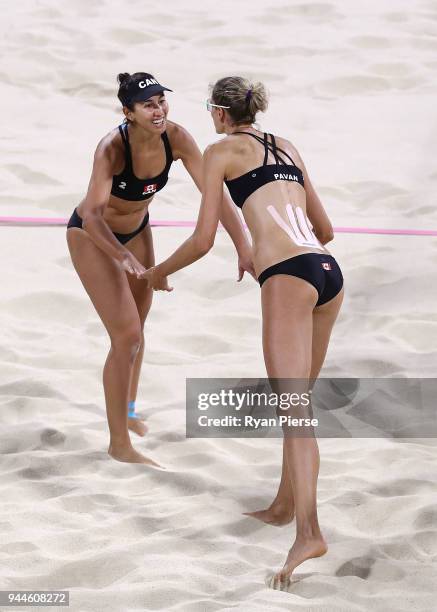 Sarah Pavan and Melissa Humana-Paredes of Canada celebrate Australia point during the Beach Volleyball Women's Semi Final match between Cyprus and...