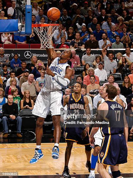 Dwight Howard of the Orlando Magic dunks against the Indiana Pacers during the game on December 14, 2009 at Amway Arena in Orlando, Florida. NOTE TO...