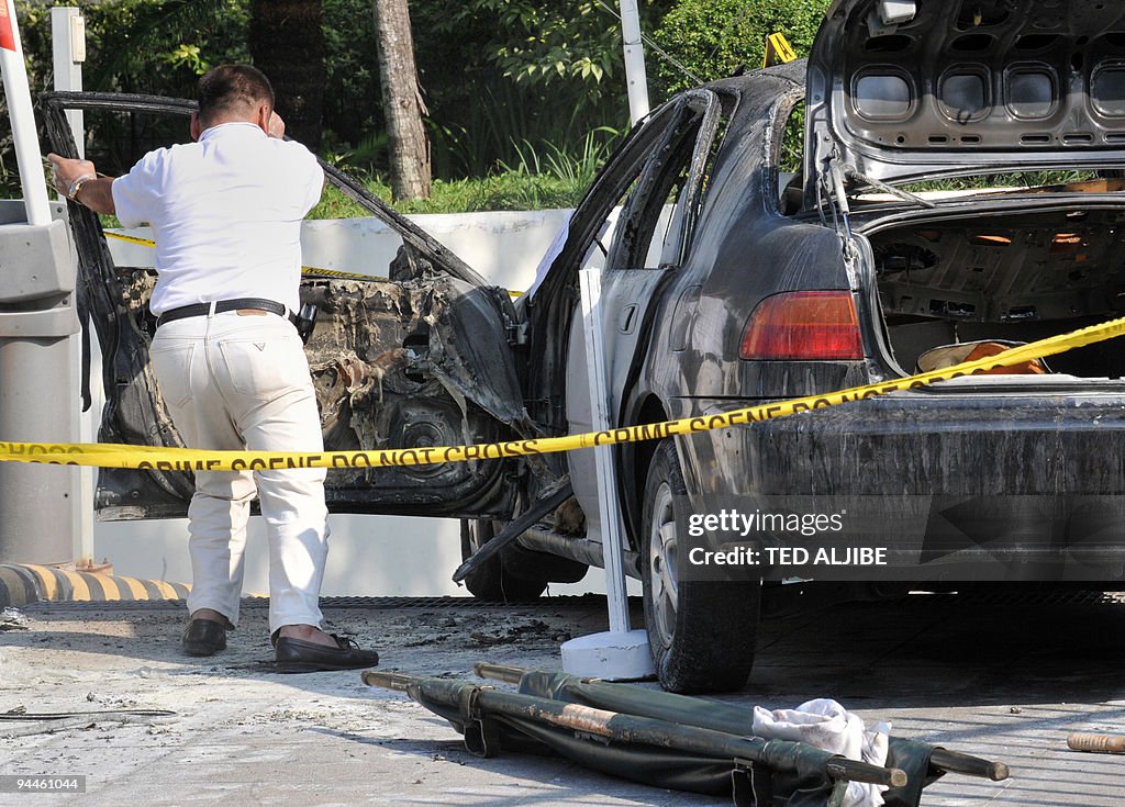 An employee from a funeral parlor opens