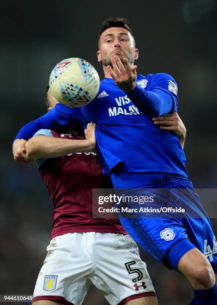 Gary Madine of Cardiff City in action with James Chester of Aston Villa during the Sky Bet Championship match between Aston Villa and Cardiff City at...