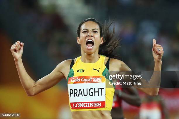 Aisha Praught of Jamaica celebrates as she crosses the line to win gold in the Women's 3000 metres Steeplechase final during athletics on day seven...