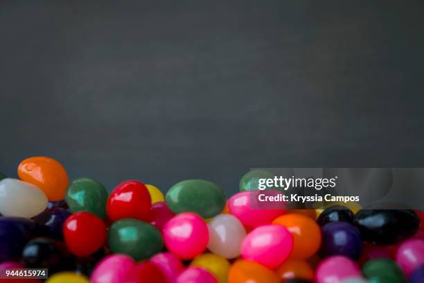 jelly beans on a blackboard - jellybean stock pictures, royalty-free photos & images