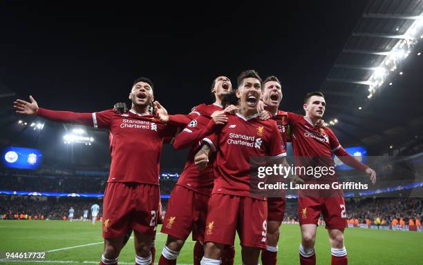Roberto Firmino of Liverpool celebrates scoring the second goal with Alex Oxlade-Chamberlain, Virgil Van Dijk, James Milner and Andy Roberton during...