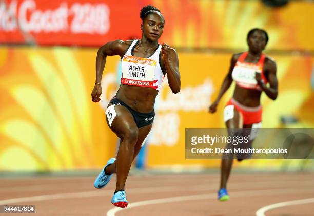 Dina Asher-Smith of England competes in the Women's 200 metres semi finals during athletics on day seven of the Gold Coast 2018 Commonwealth Games at...