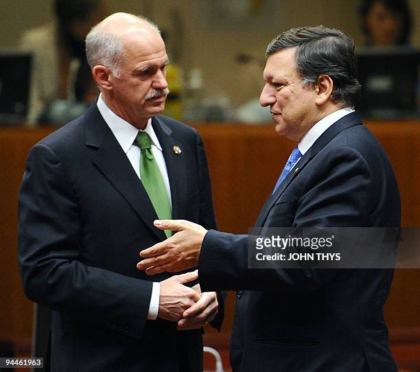 Greek Prime Minister George Papandreou talks with European Commission President Jose Manuel Barroso prior to a working session at an European Union...