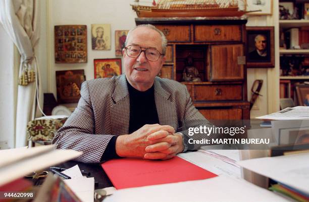 The candidate of the National Front for presidential election Jean-Marie Le Pen poses on November 26, 2001 at his office from his home in Saint-Cloud.