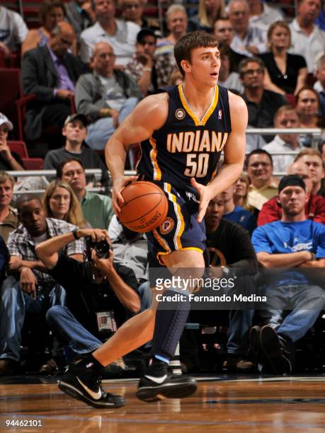 Tyler Hansbrough of the Indiana Pacers moves the ball against the Orlando Magic during the game on December 14, 2009 at Amway Arena in Orlando,...