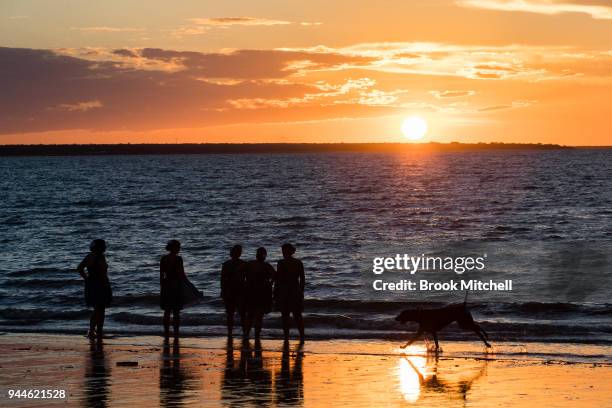 People enjoy the sunset on Mindil Beach on April 8, 2018 in Darwin, Australia. Darwin is the capital of the Northern Territory. It is the smallest...